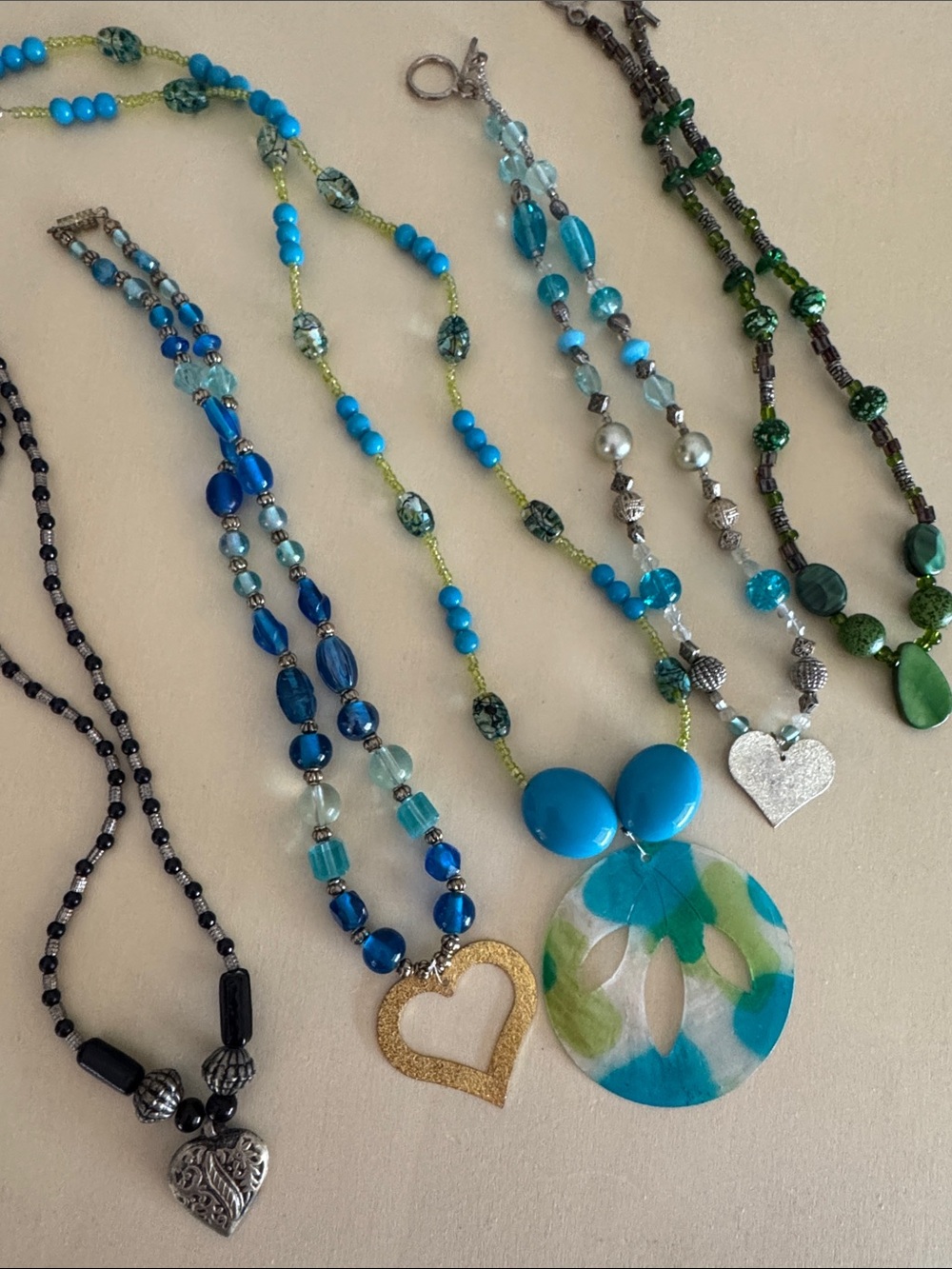 Bundle of 5 beaded necklaces.